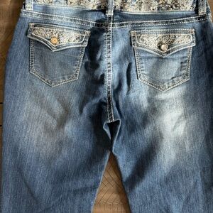 NWOT RUE21 PREMIERE Jeans size. Beautiful double stitching with lots of bling.